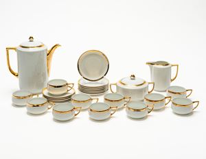 White porcelain coffee set with gold handles and a gold band along the edge. Verbano Laveno