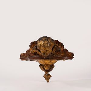 Mensola in legno intagliato e dorato con cherubino, secolo XVIII