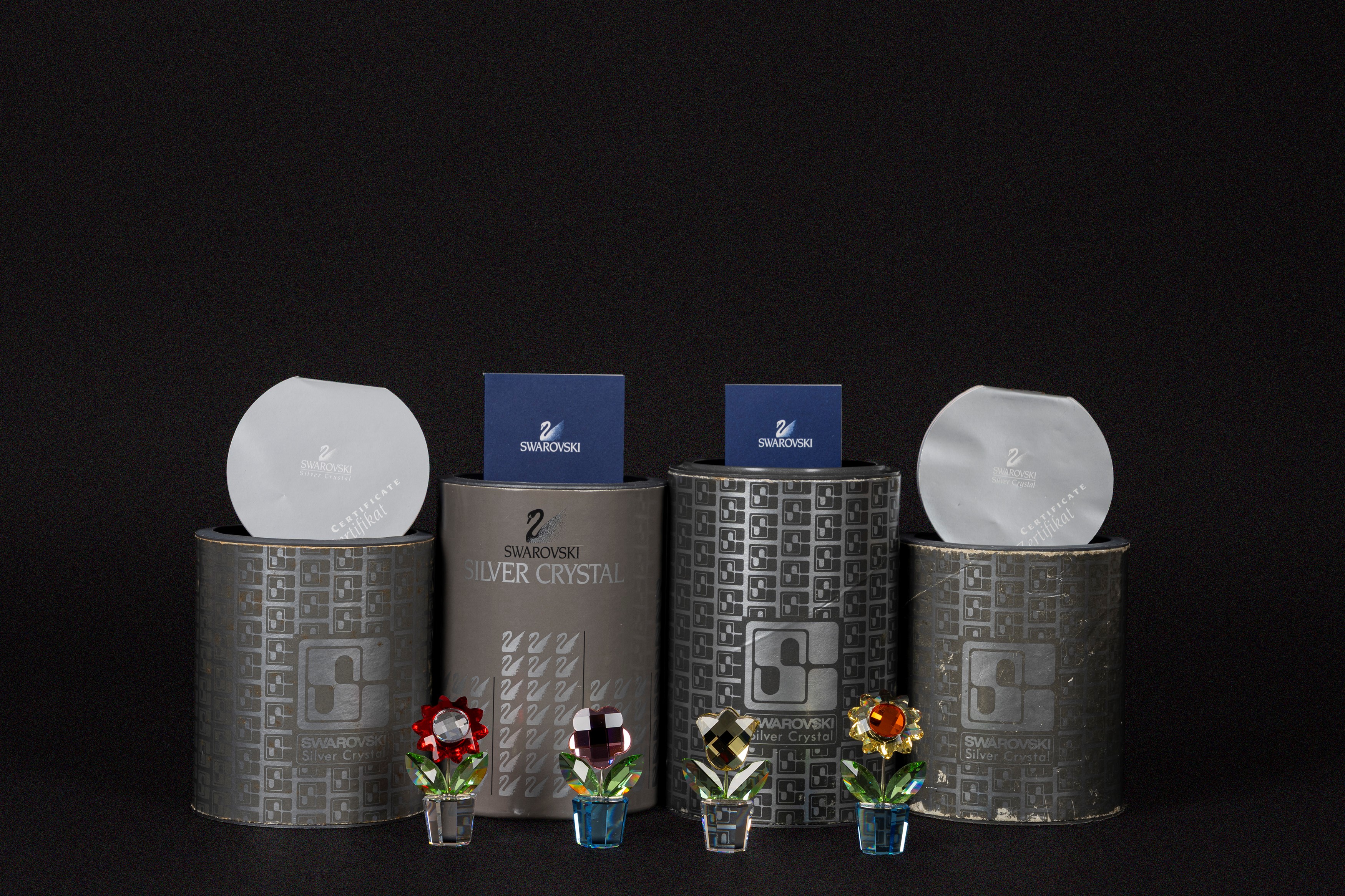 Swarovski - Happy flowers: Tulipano giallo; Aster; fiore rosa e girasole in cristallo