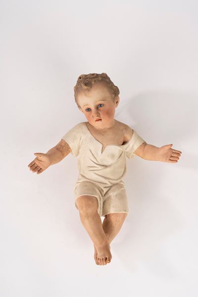 Manifattura tedesca, Gesù Bambino in terracotta policroma con occhi in vetro
