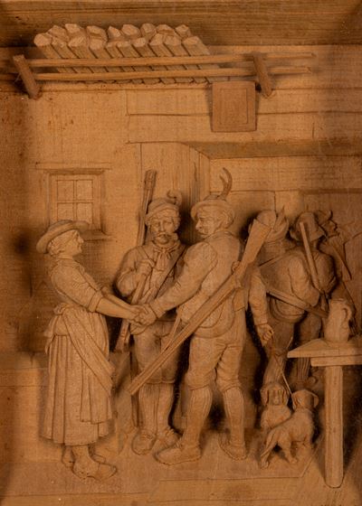 La partenza per la caccia, altorilievo su legno