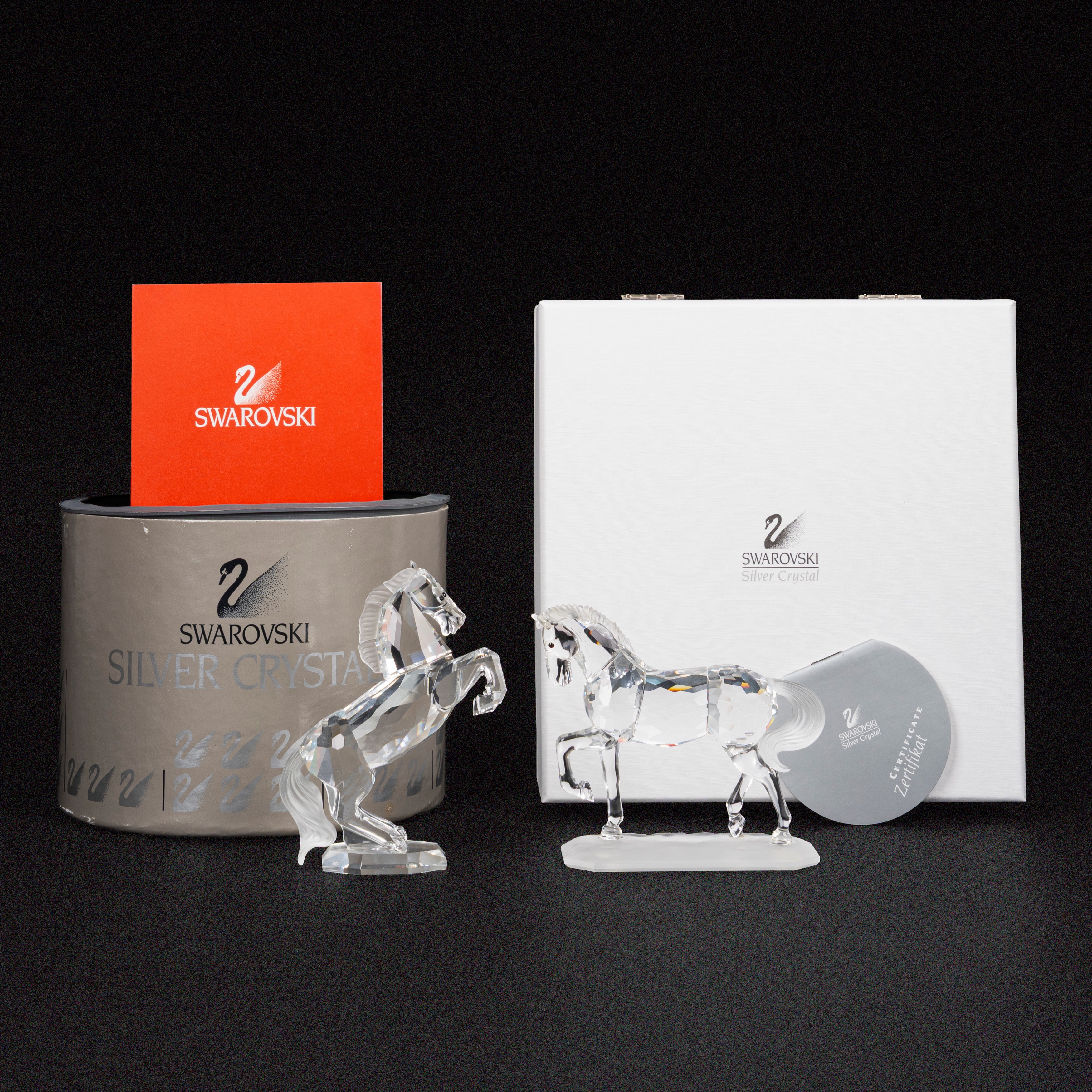 Swarovski - Stallone arabo e stallone bianco (serie “Horses on Parade”), scultura in cristallo