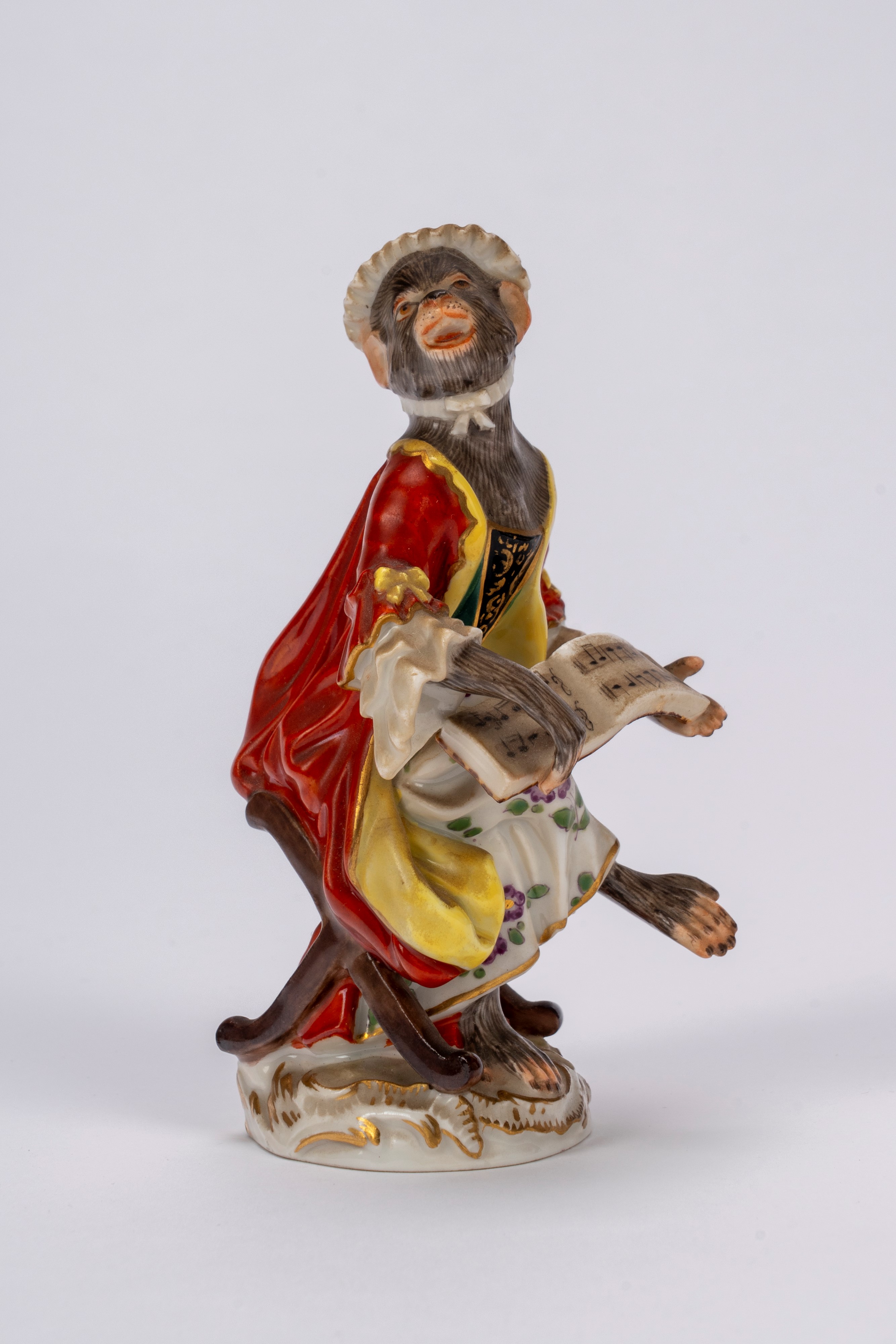 Manifattura di Meissen, Orchestra di scimmie in porcellana policroma, con leggio