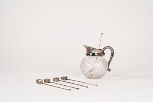 Small crystal and silver-plated metal jug and six cocktail spoons