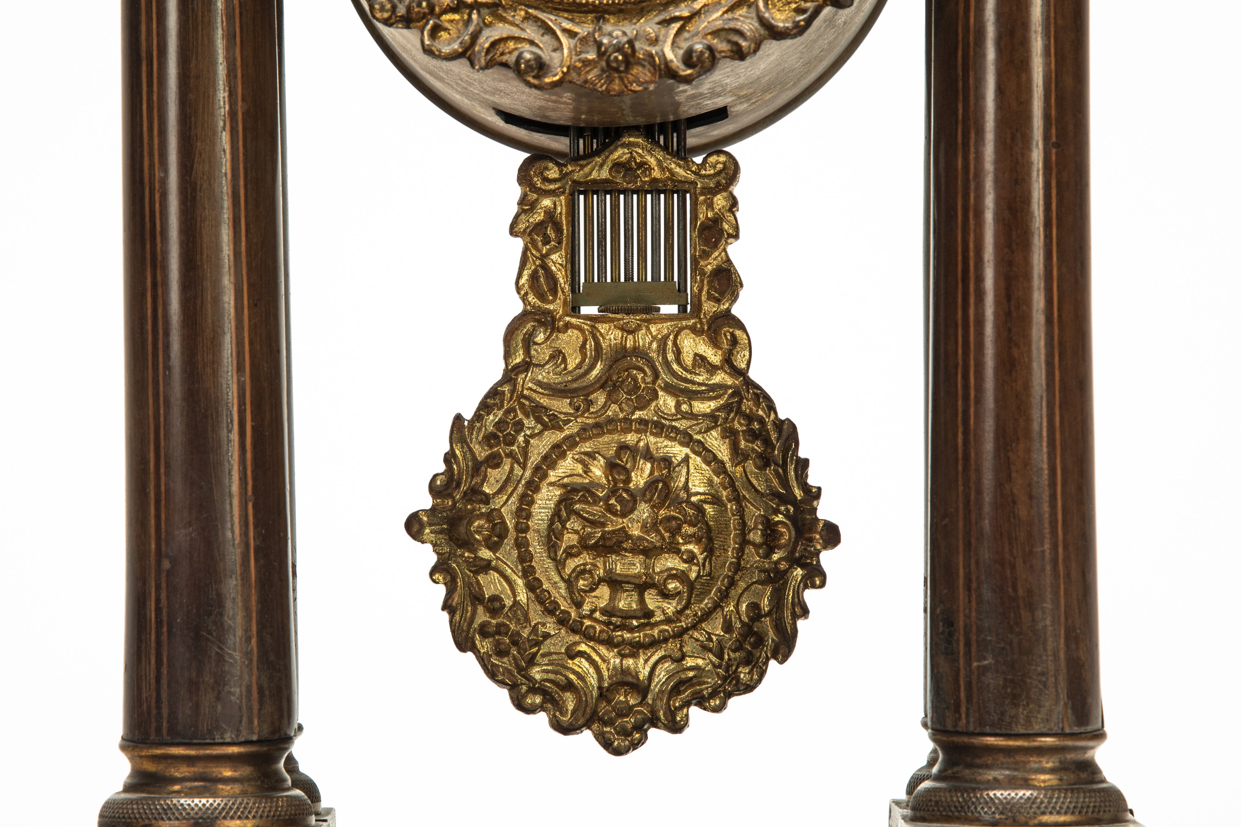 Pendola Carlo X, portico in legno filettato e intarsiato a motivi vegetali