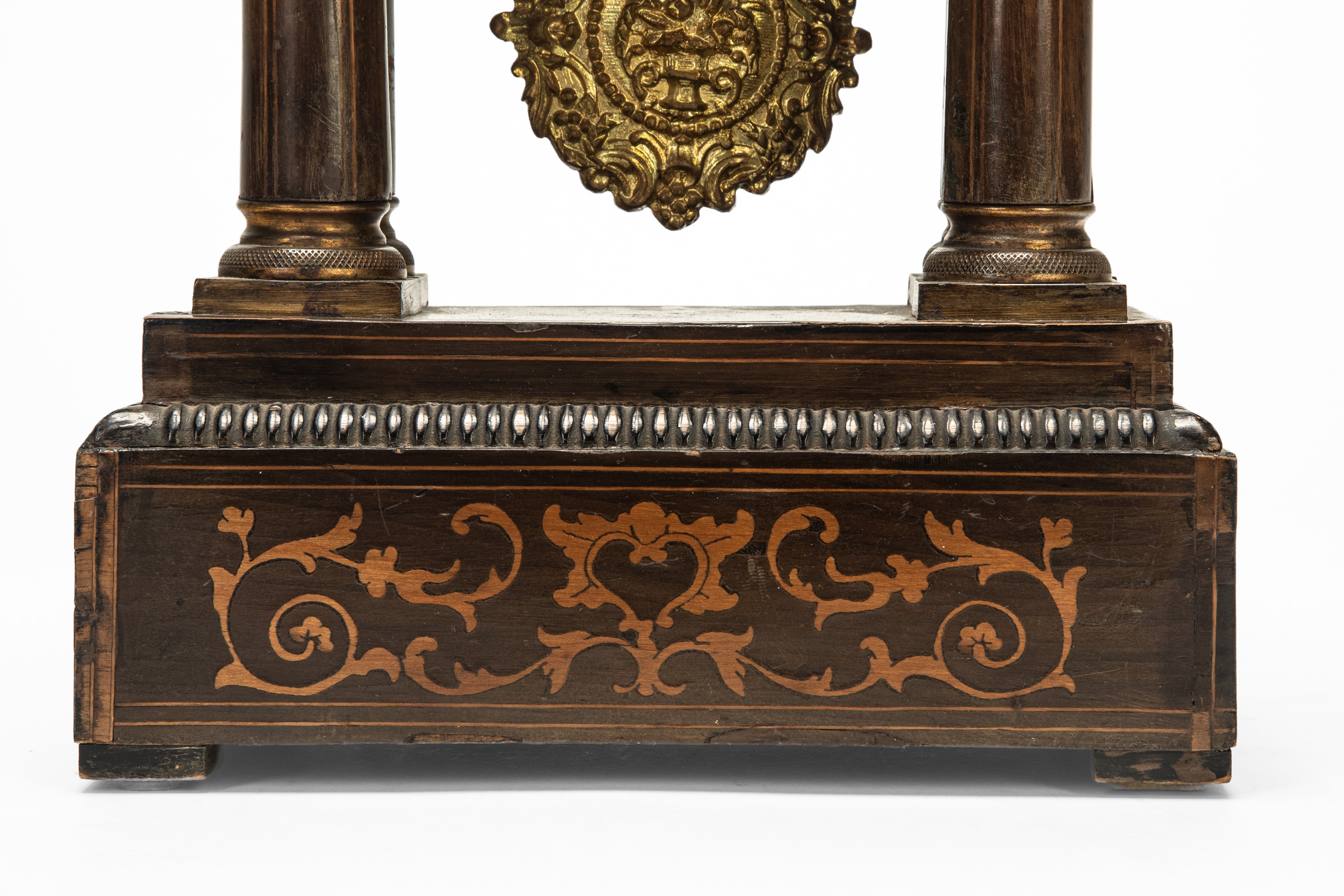 Pendola Carlo X, portico in legno filettato e intarsiato a motivi vegetali