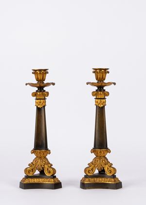 Coppia di candelieri in metallo e bronzo dorato, secolo XIX