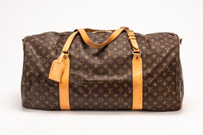 Valigia Polochon, tela monogram con chiusura a zip e tracolla staccabile