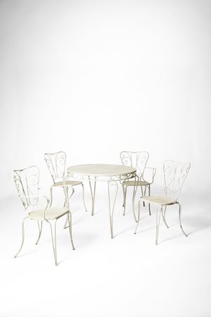 Set da giardino composto da un tavolo rotondo, una coppia di sedie e una coppia di poltroncine