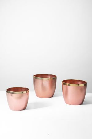 Set composto da tre cache-pot 