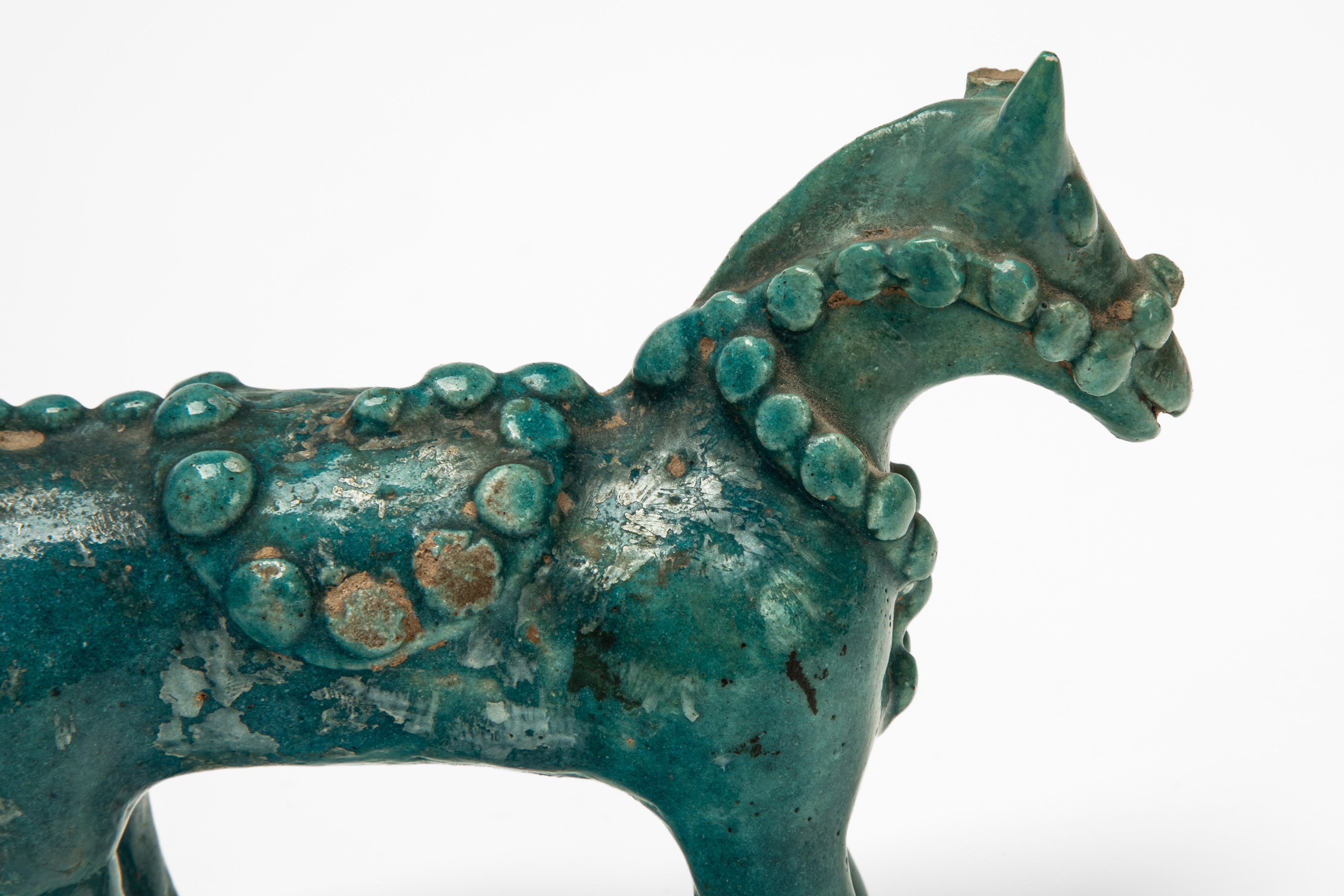 Antico cavallino persiano, ceramica invetriata monocroma turchese