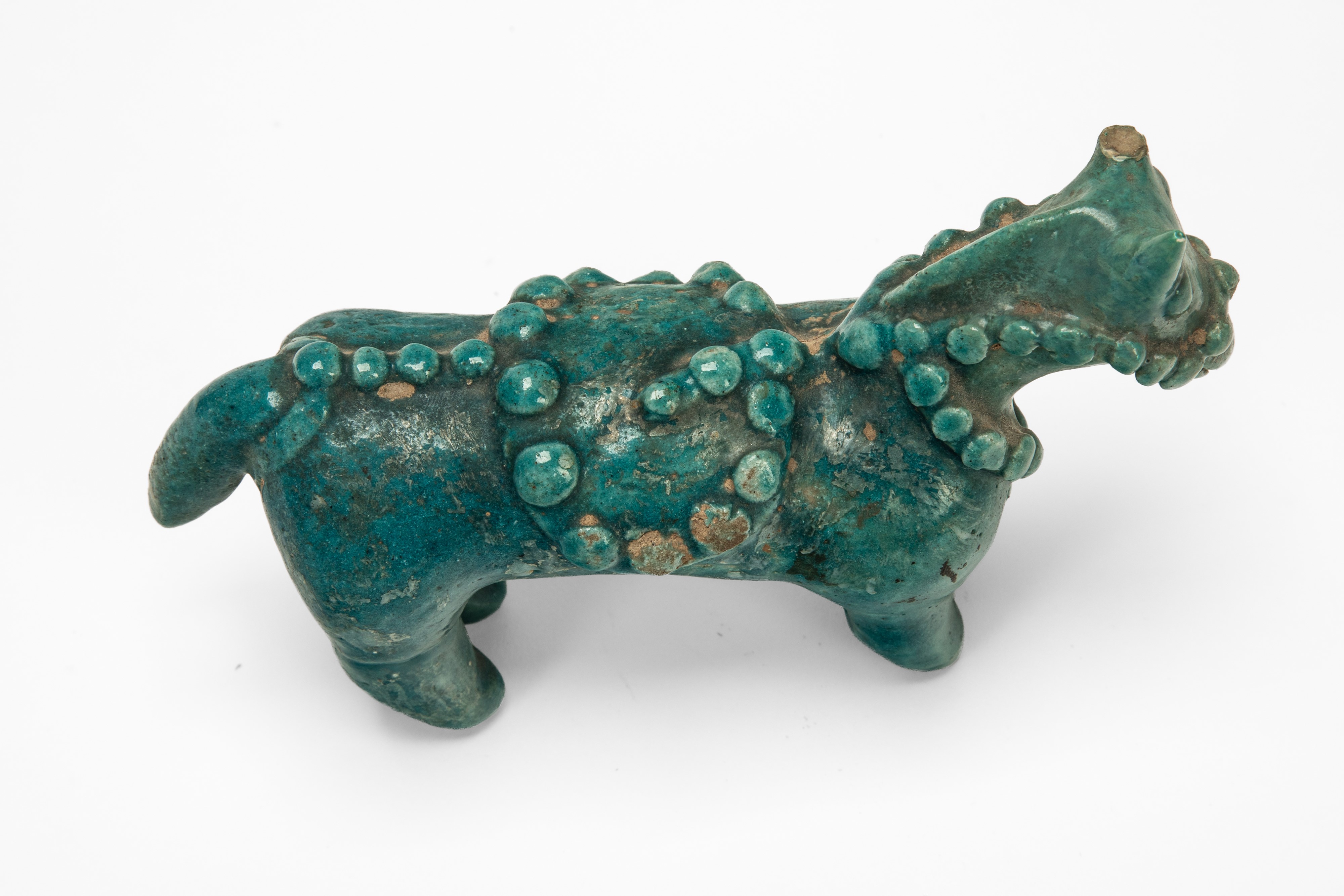Antico cavallino persiano, ceramica invetriata monocroma turchese