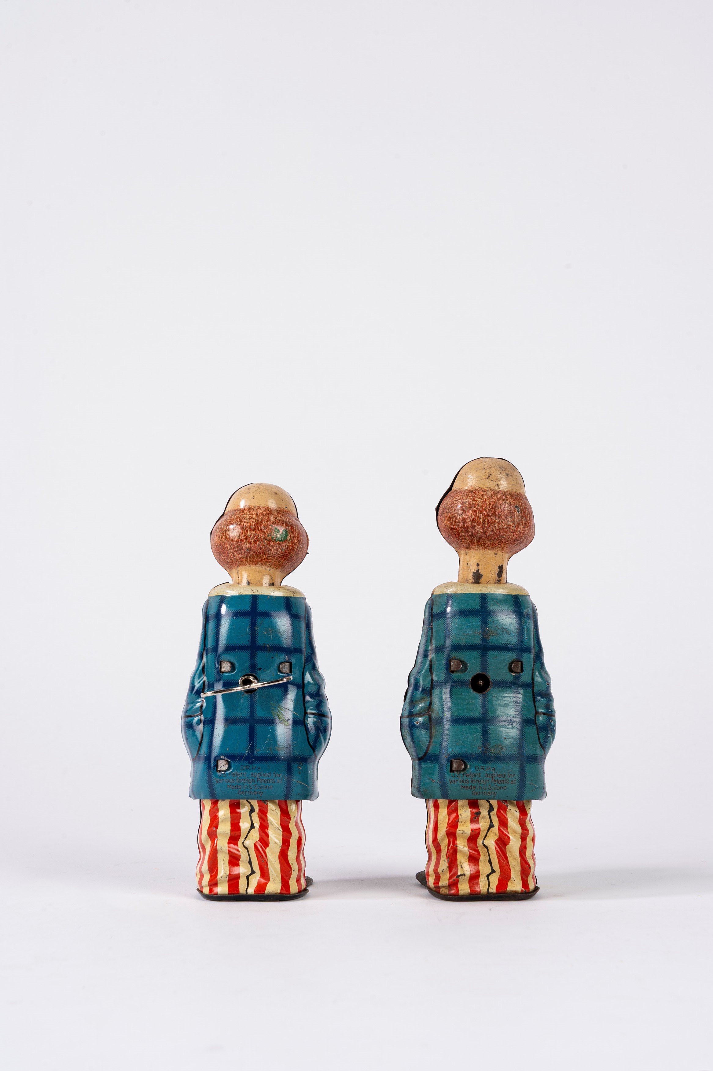 Distler - Due Happy Clown in latta litografata con meccanismo a molla