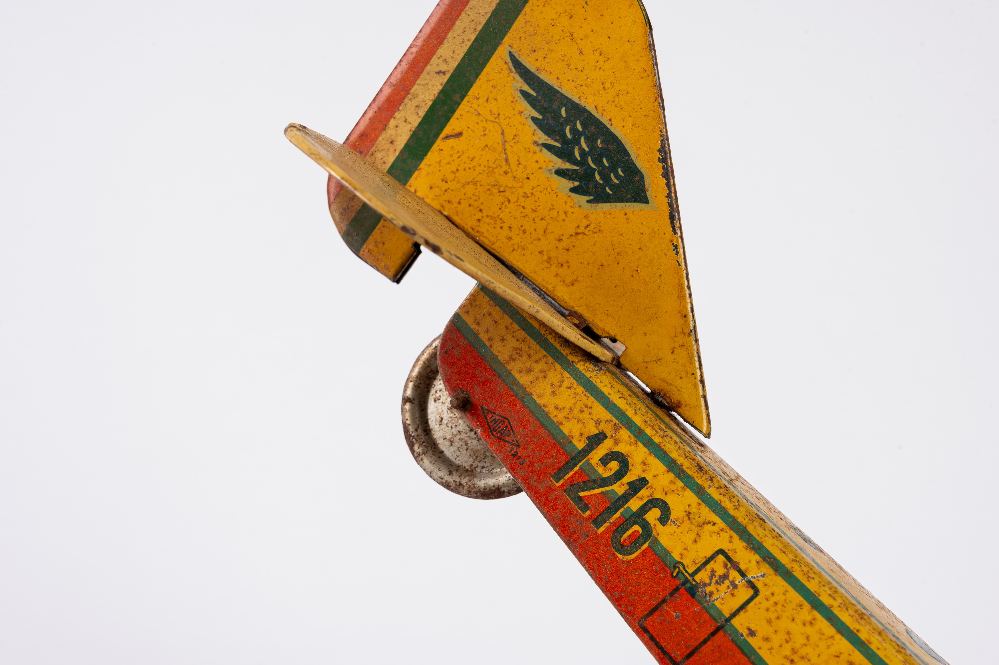 Ingap - Aereo I-TRIS 1206, latta litografata biplano con elica centrale e carica a molla (anni 19...