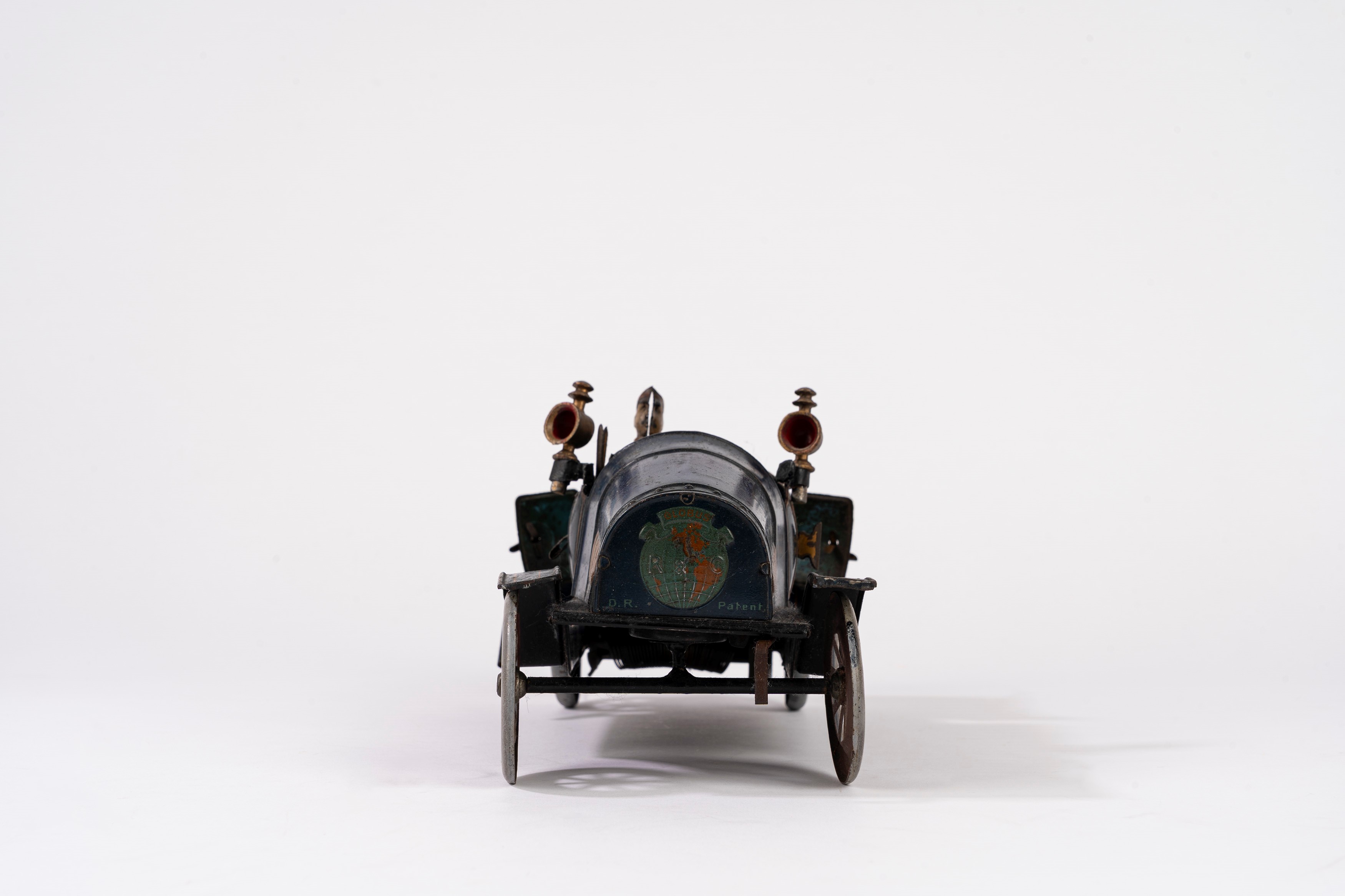 Richter & Co - Autovettura coupé in latta litografata, meccanismo a carica a molla, 1900s