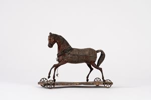 CAVALLO su ruote latta