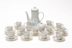 Set of twelve coffee cups and saucers, a coffee pot, a milk jug, and a sugar bowl. Colditz, East Germany.