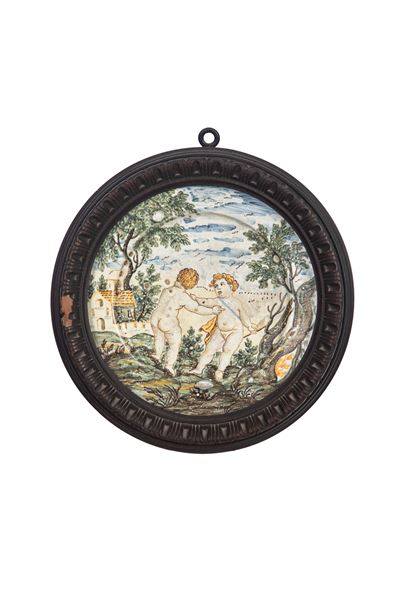 Castelli, Piattello in maiolica policroma istoriata con cornice circolare
