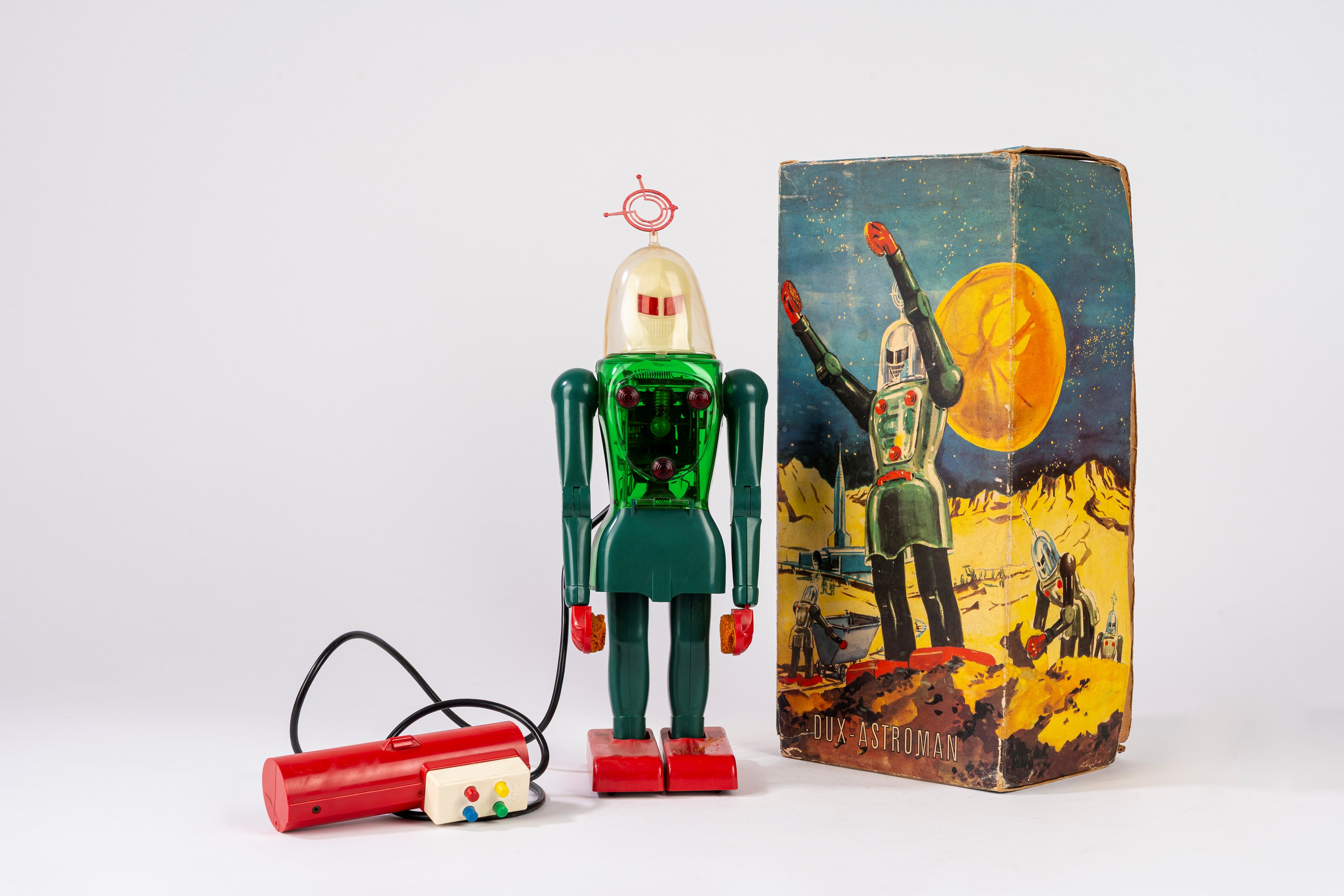 Dux - Robot giocattolo “ASTROMAN”, plastica con telecomando, funzionamento a batteria (anni 1950)