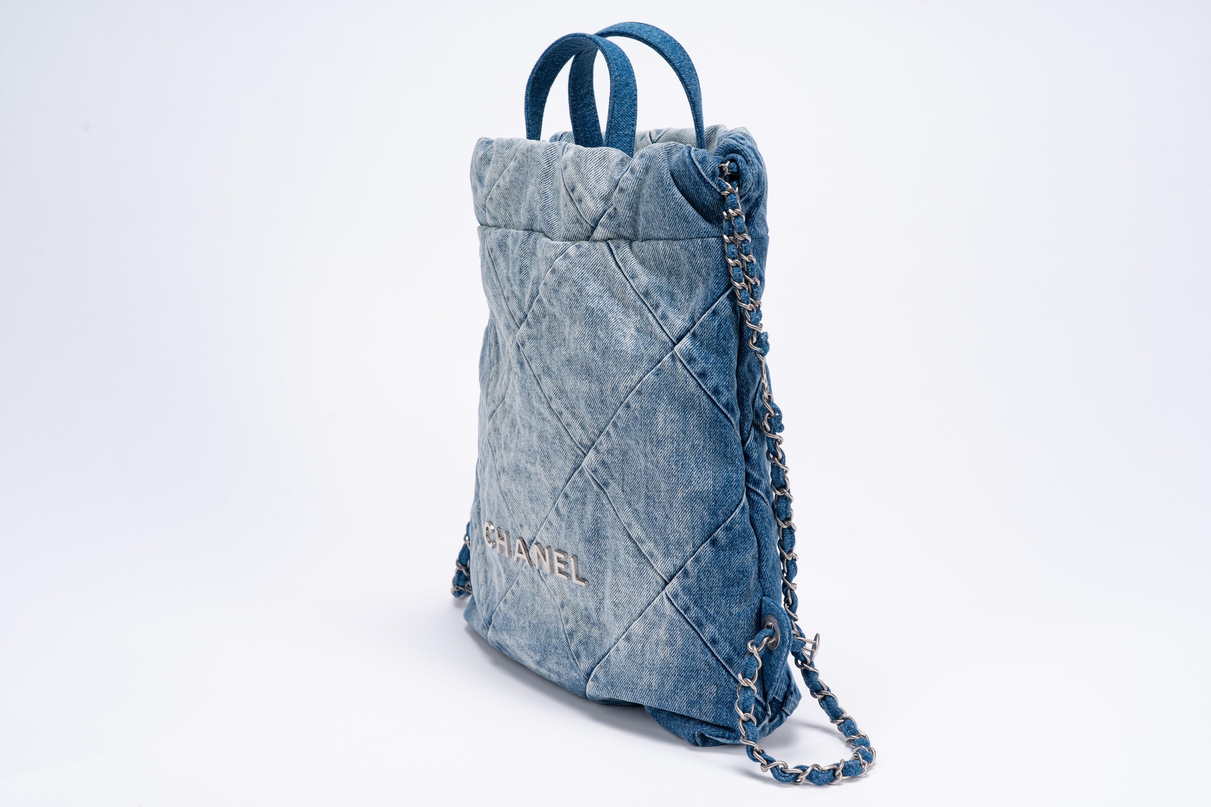 Chanel - Zaino 22, tela denim matelassé