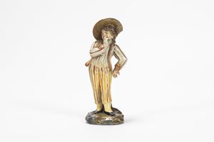 Figura maschile in porcellana policroma. Probabilmente Venezia, secolo XVIII.