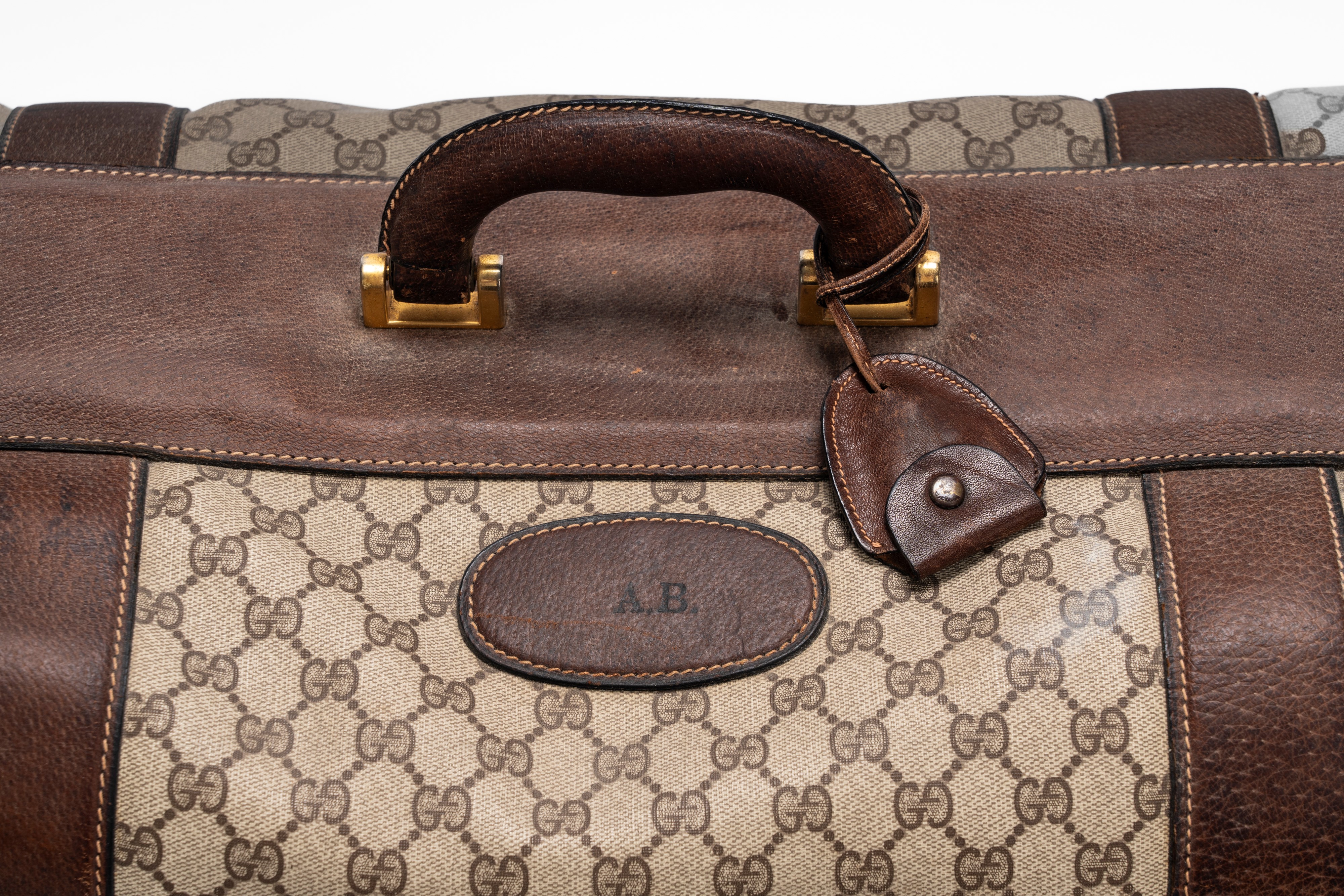 Gucci - Set di 3 valigie e porta abiti, in tela monogrammata plastificata color beige