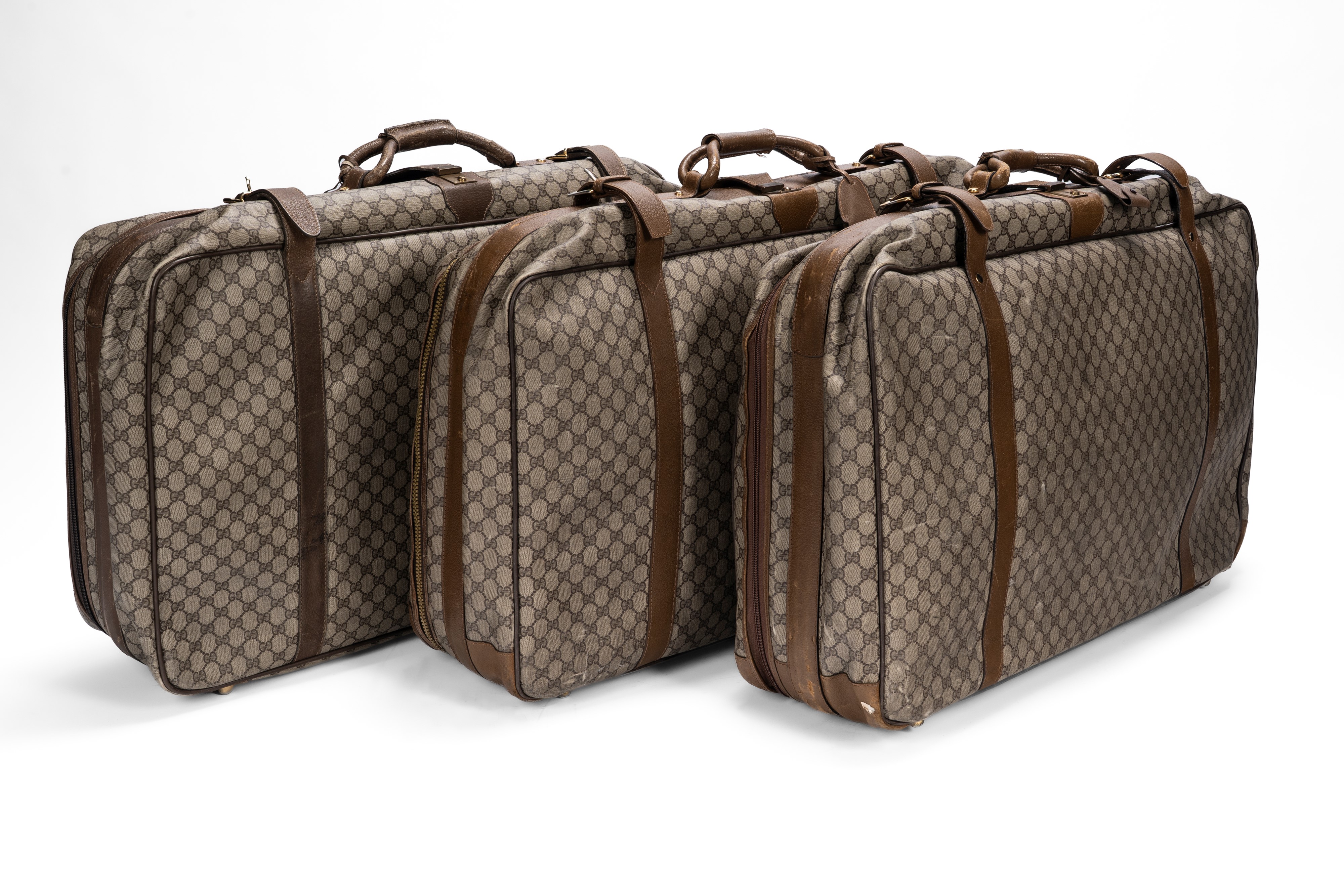 Gucci - Set di 3 valigie e porta abiti, in tela monogrammata plastificata color beige
