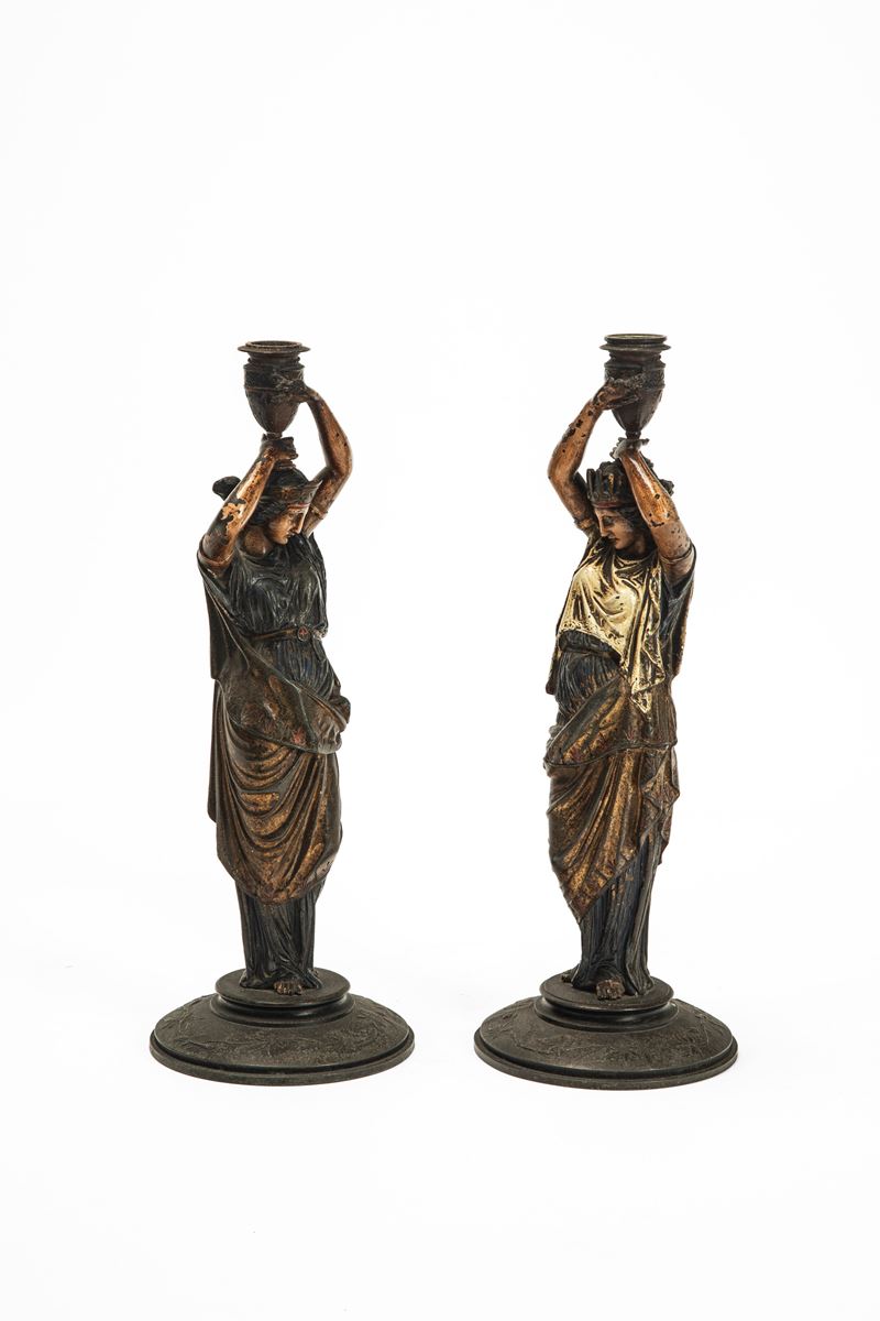 Coppia di candelieri a figure femminili panneggiate, metallo laccato (fine secolo XIX)