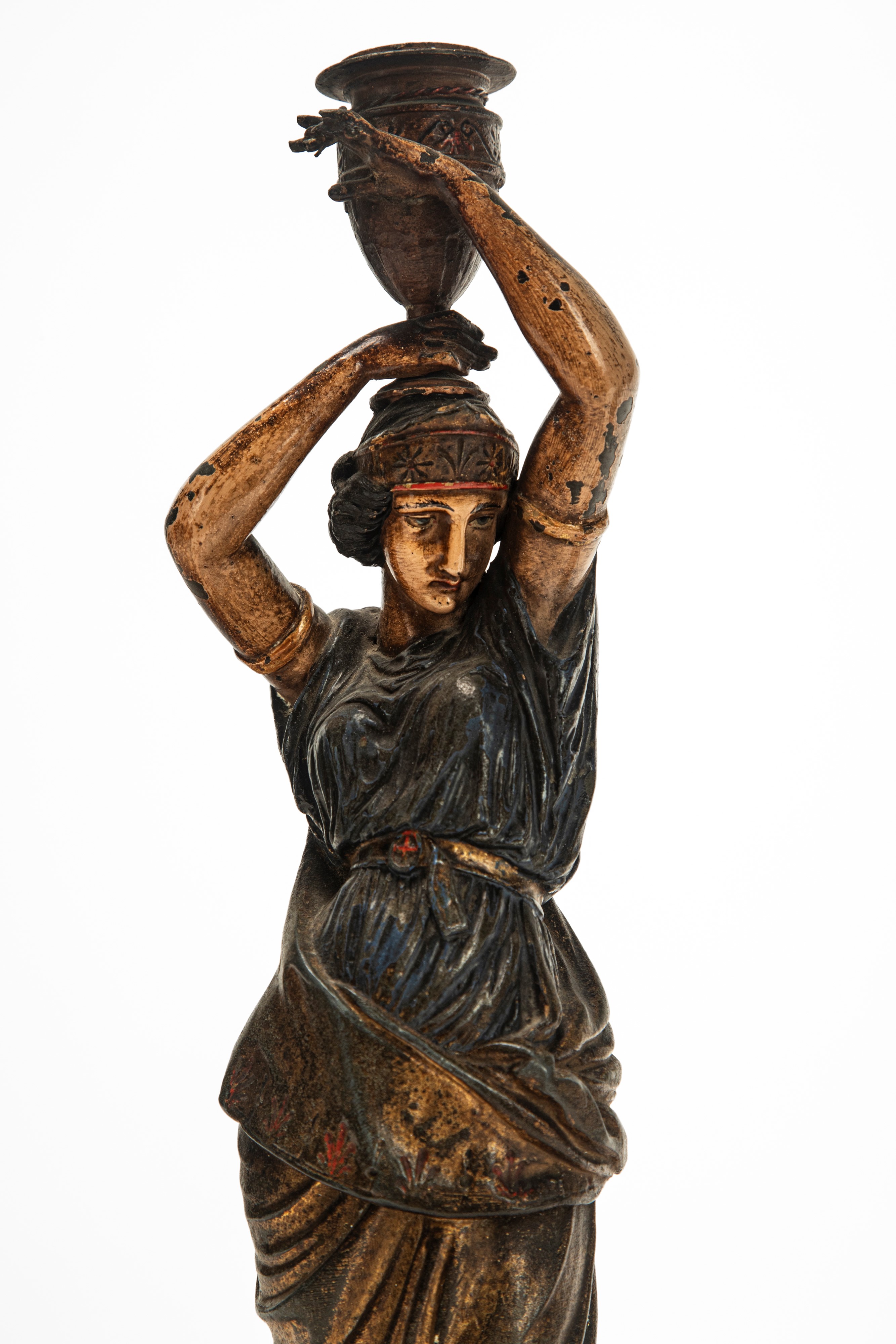 Coppia di candelieri a figure femminili panneggiate, metallo laccato (fine secolo XIX)