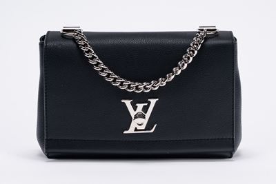 Borsa Lockme, in pelle nera con manico a catena metallica, tracolla staccabile (2016)