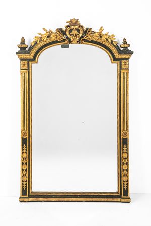 Specchiera in legno ebanizzato e dorato, secolo XIX.