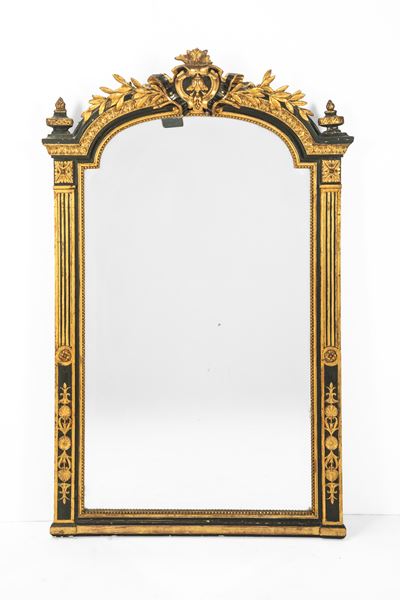 Specchiera in legno ebanizzato e dorato, secolo XIX