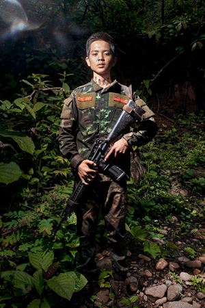 Burmese jungle, KNDF territory. Mari-oo is 18 years old and one of the youngest members of the Burmese guerrilla forces. Mari-oo was a brilliant student who dreamed of working in the field of computer science. Today, however, he admits that his only wish is to return to