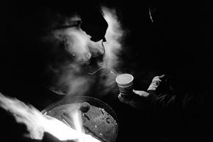 Tea time at the Kurdish camp in the Dunkirk refugee camp, France, along the English Channel migration route to England. Dunkirk, France.