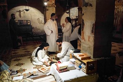 Preparation of the chants for the Holy Liturgy, Deir Mar Musa al-Habashi Monastery. Syria