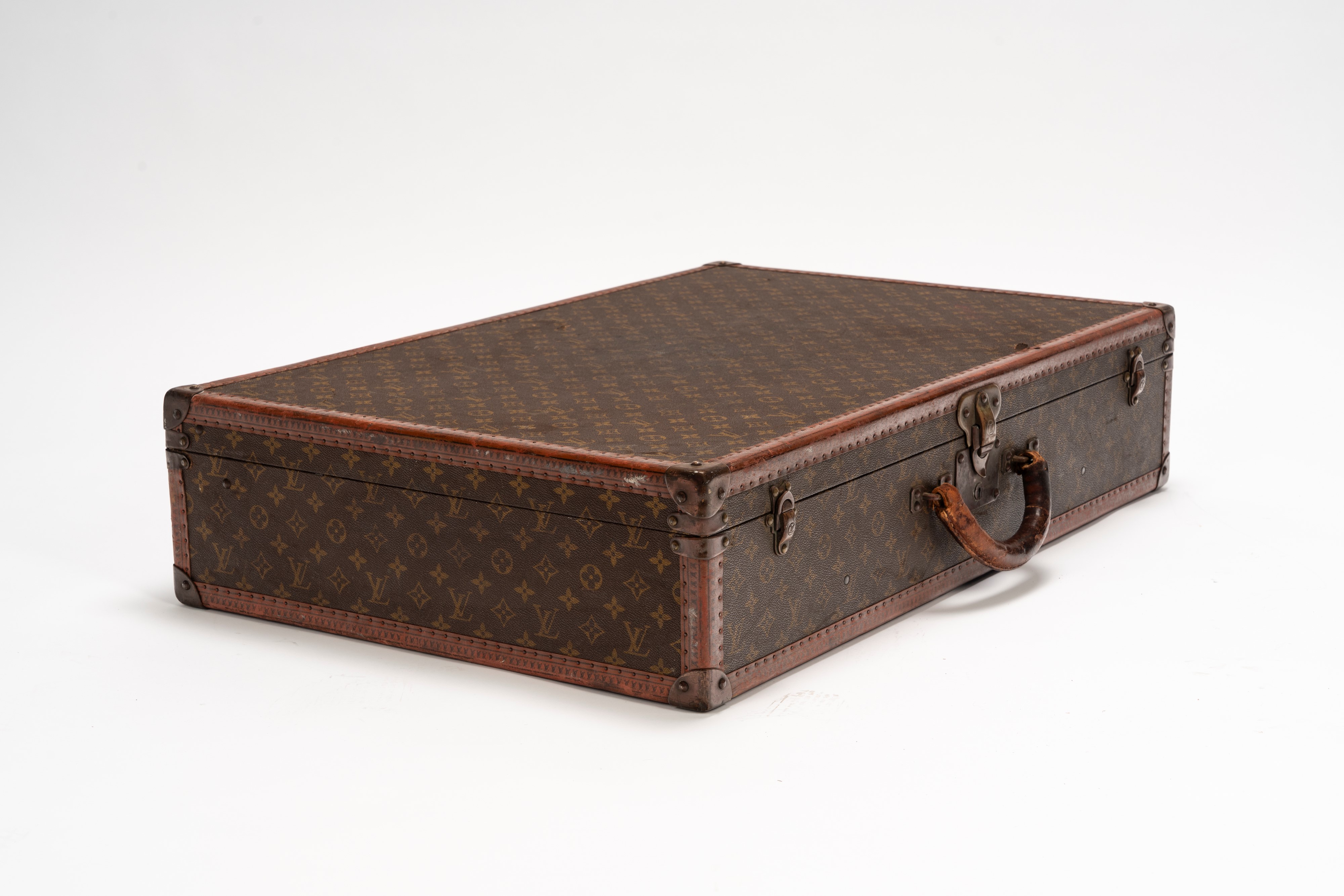 Louis Vuitton - Valigia Alzer, tela monogrammata con profili in cuoio e dettagli in ottone