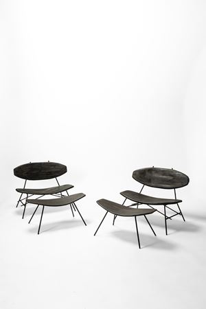 Pair of armchairs with ottomans