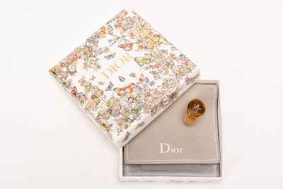 Anello “CD Stella” in metallo dorato con occhio di tigre