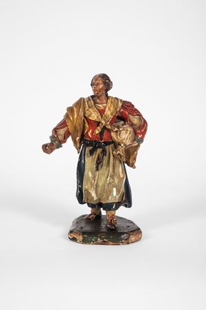 Figura presepiale in legno policromo. Probabilmente ambito genovese, secolo XVIII.