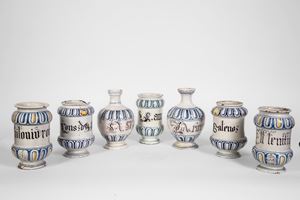 Sette vasi da farmacia in maiolica policroma. Italia settentrionale, XVIII secolo.