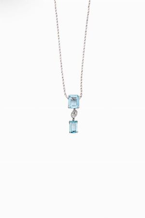 in oro bianco 18kt, acquemarine e diamanti