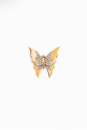 spilla in oro bicolore 18kt e diamanti