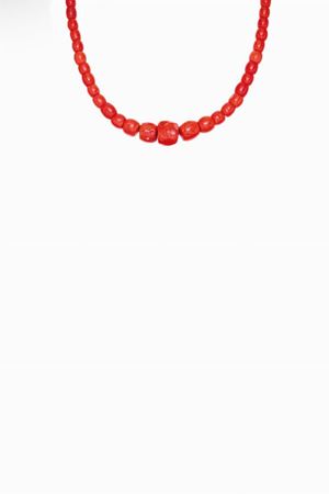 in metallo dorato e corallo