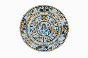 Manifattura dell'Italia meridionale, fine secolo XVIII - inizi secolo XIX - Piatto in ceramica con santa monaca 