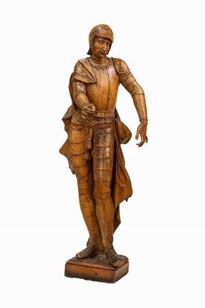 Due sculture lignee raffiguranti armigeri