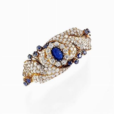 Bracciale in oro 18 kt con zaffiri e diamanti, canna vuota a motivo centrale applicato