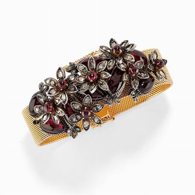Bracciale in argento, oro, granati e diamanti, maglia a tessuto con inserto centrale