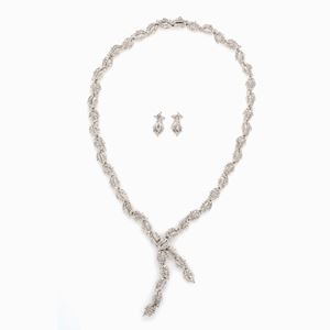 DEMI PARURE IN  ORO E DIAMANTI, KNIGHT
c