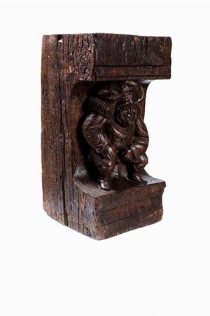 Architectural element representing a grotesque figure