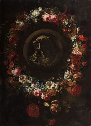 Bas reliefe en grisaille representing Christ within flowers